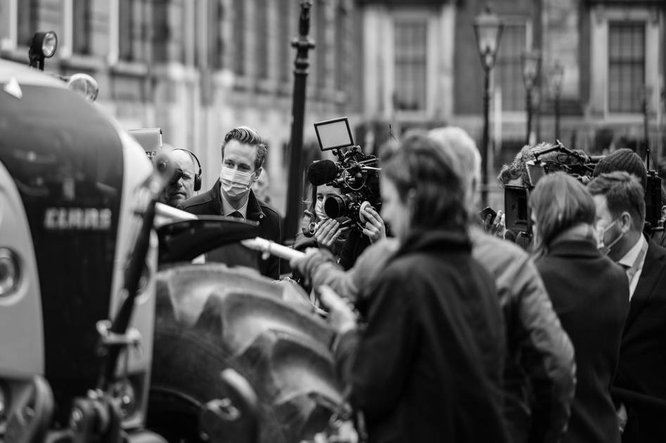 Media insurance blog hero with camera gear and policy documents