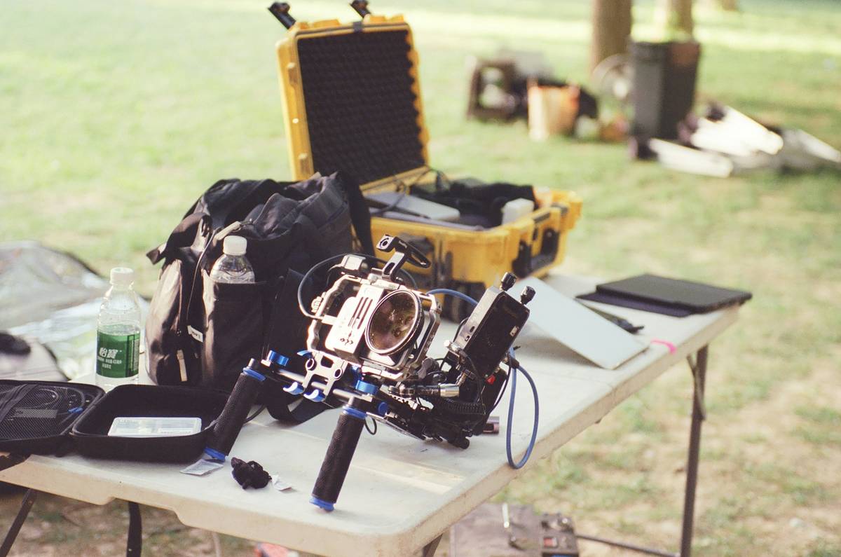 Camera gear covered under a production gear plan during an outdoor film shoot